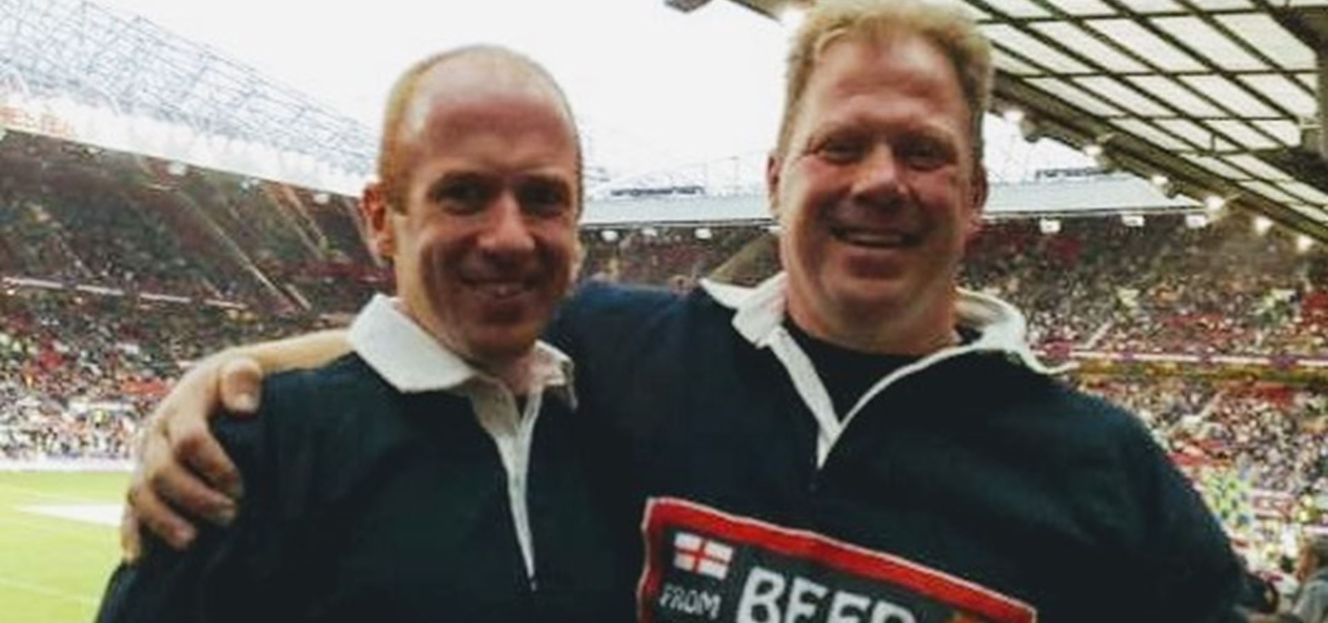 Richard and his brother Tim at a rugby match