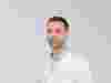 Sirio Dupont wearing lab coat